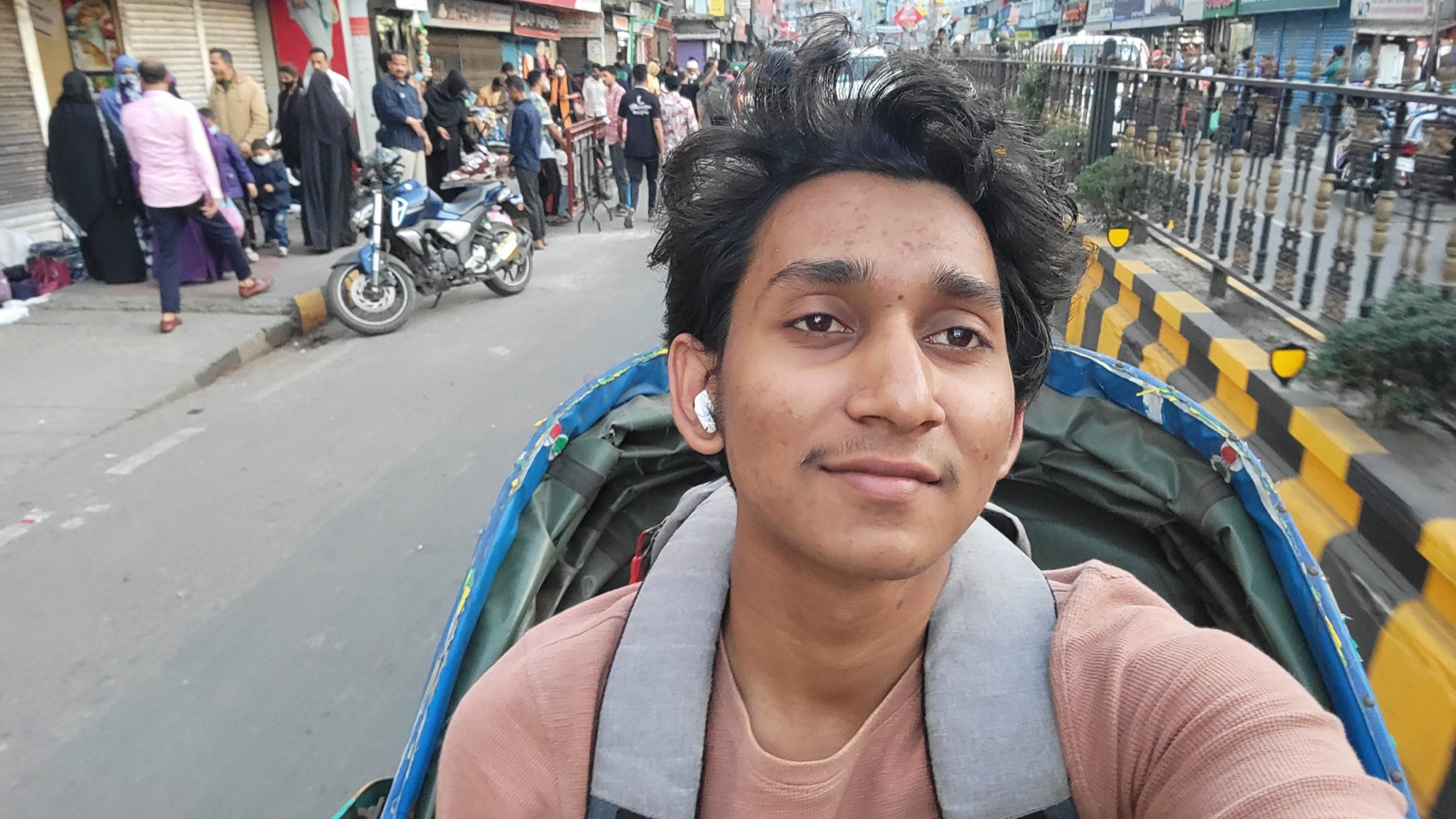 Documentary travel self portrait in a busy city