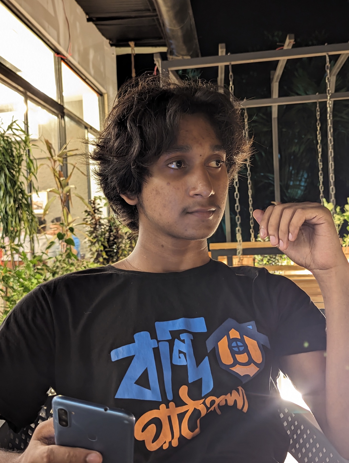 Abdul in evening cafe light