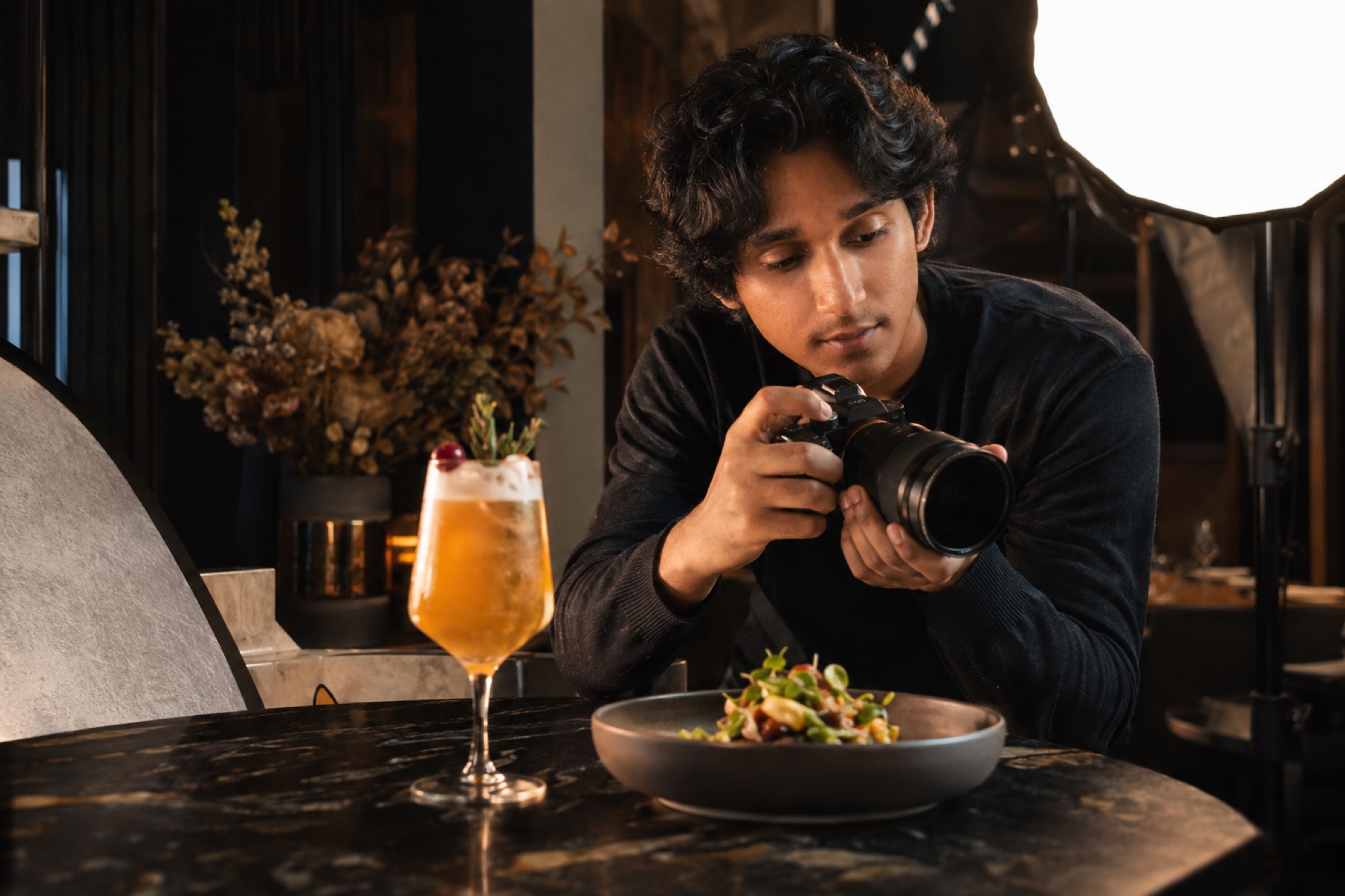 Abdul photographing restaurant food and drink